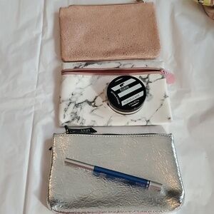 Ipsy mettalic cosmetic Bags 3 each plus 2 products